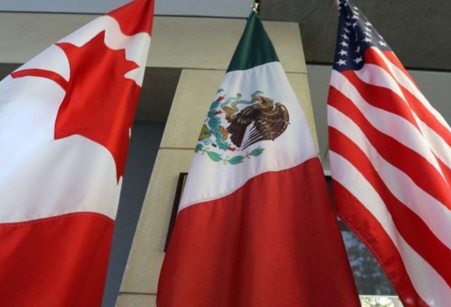 Economía, tratado, banderas de Estados Unidos, Canadá y México (Imagen: Especial)