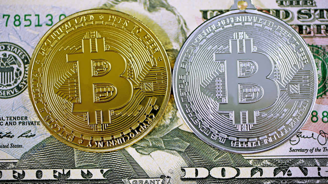 Bitcoin sube a 21 mil dólares pese a alza de tasas de la Fed